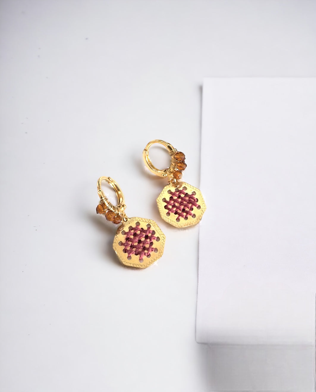 Motivo earrings